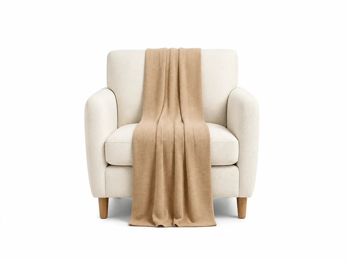 50 by 60 inch throw blanket on an armchair