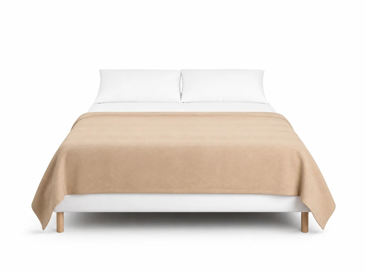 80 by 90 inch blanket on a queen bed